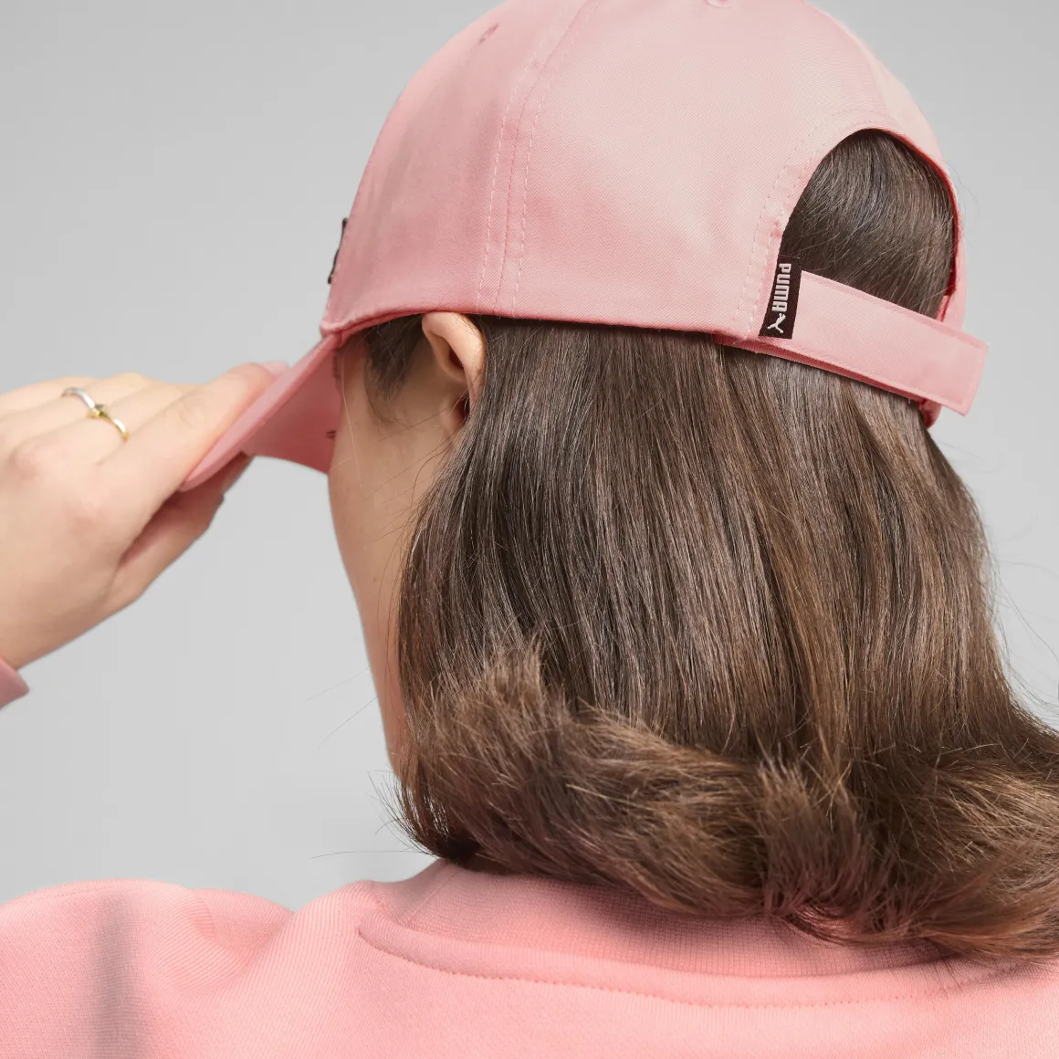 Cappellino rosa con logo e chiusura con strappo Puma Ess Metal