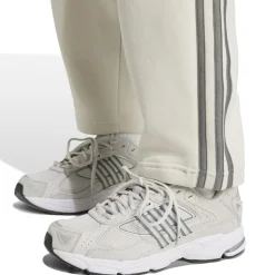 Pantaloni joggers da donna bianchi con logo adidas