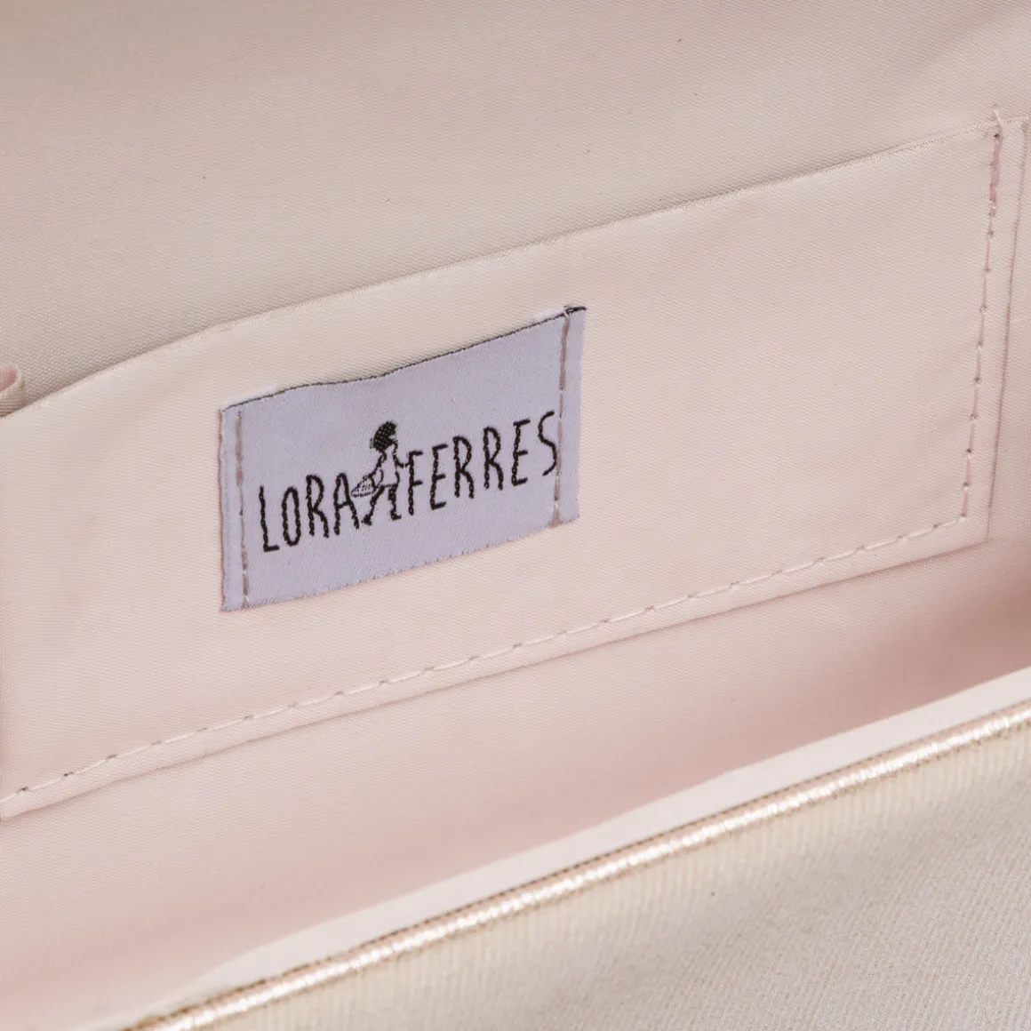 Pochette da donna champagne con glitter con logo dorato Lora Ferres