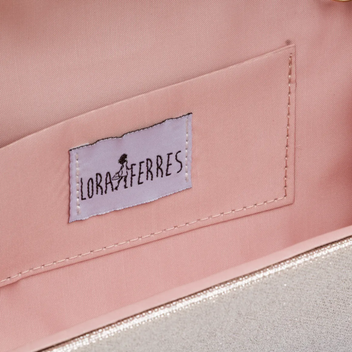 Pochette da donna oro rosa con glitter con logo Lora Ferres