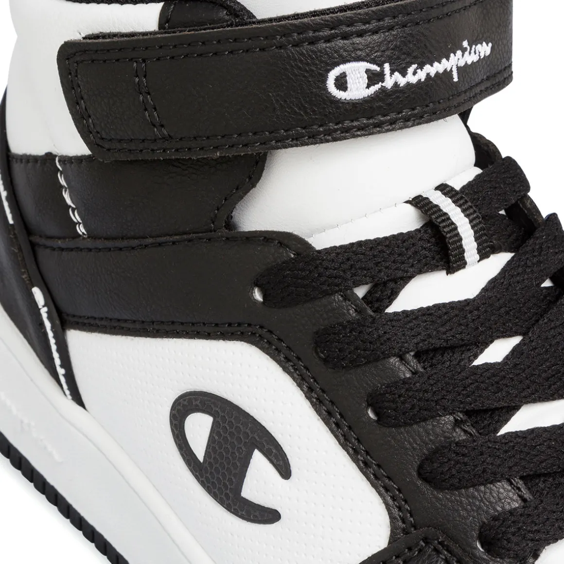 Sneakers alte da ragazzo bianche e nere con logo Champion Rebound 2.0 Mid