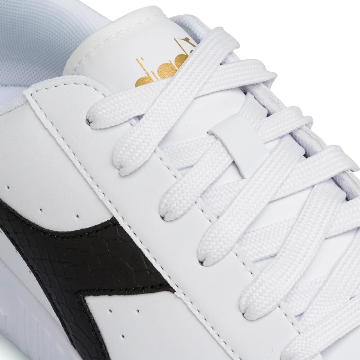 Sneakers bianche con dettaglio nero e oro da Ragazza Diadora