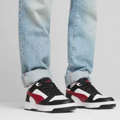 Sneakers casual da uomo bianche con dettagli neri e rossi e logo Puma Rebound V6
