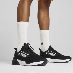 Sneakers da uomo nere e bianche con logo Puma Retaliate 3