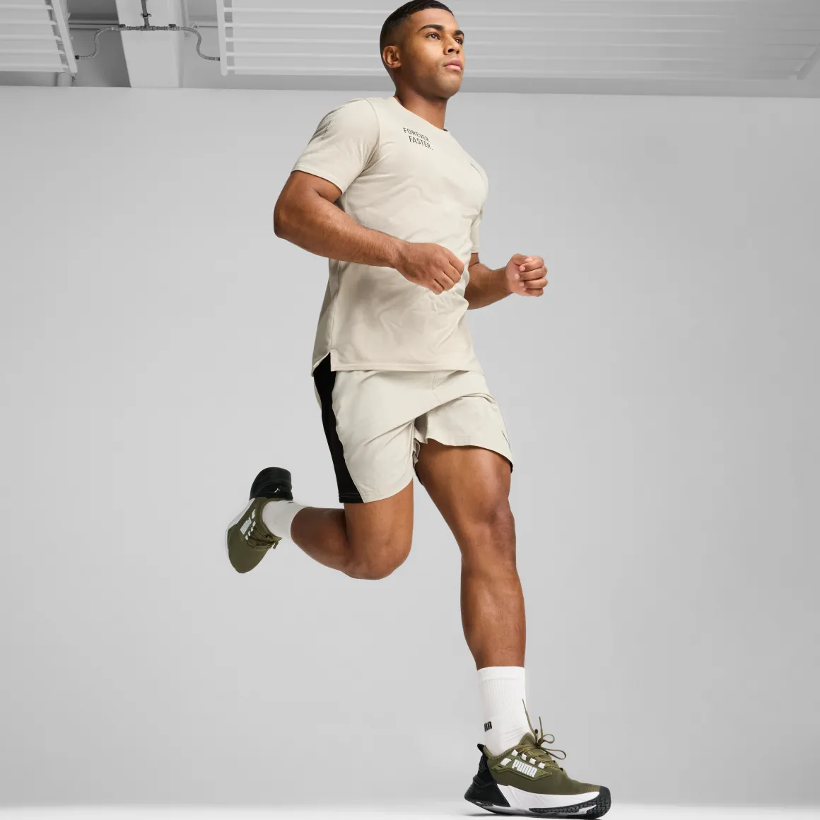 Sneakers da uomo verde militare con logo Puma Retaliate 3