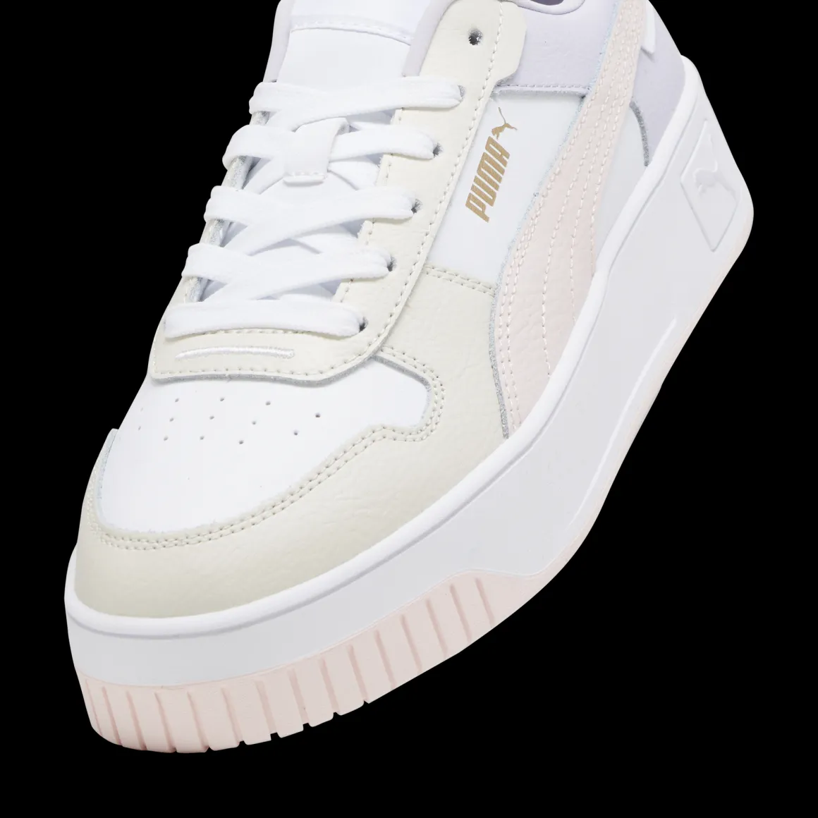 Sneakers platform casual da donna bianche con dettagli rosa e logo Puma Carina Street