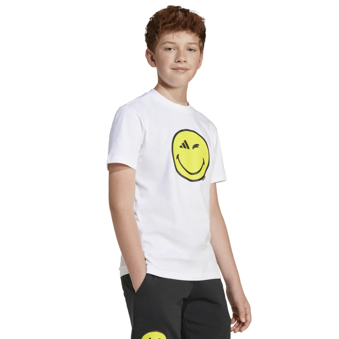 T-shirt bianca da Ragazzo con Smiley giallo adidas